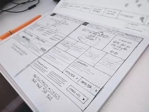 Designer sketching up web pages